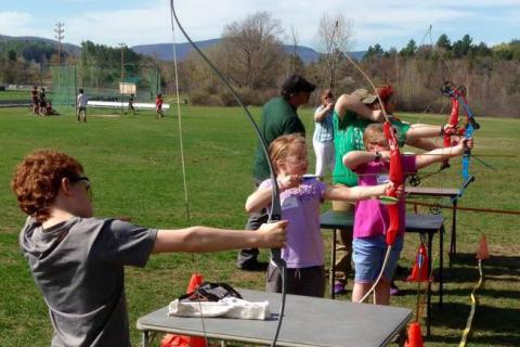 Children participating in archery